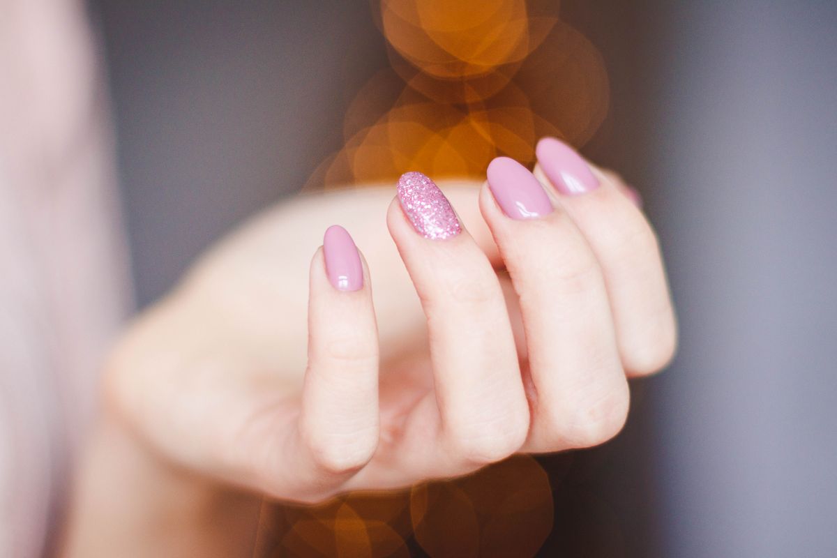 Pink glitter nail art detail from PinkLuxe Nail Bar